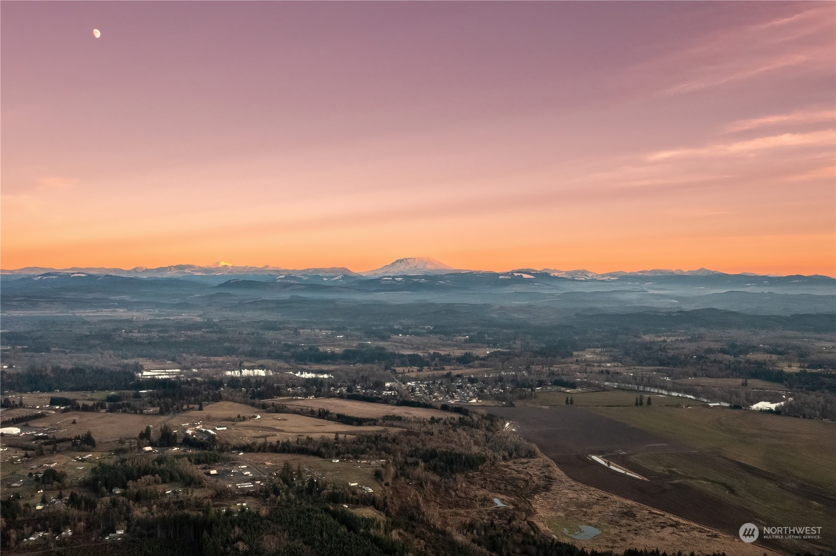 440 Knowles Road Winlock, WA 98596 - Photo 3 of 15 a view of a town with mountains in the background