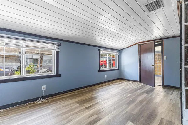 an empty room with windows