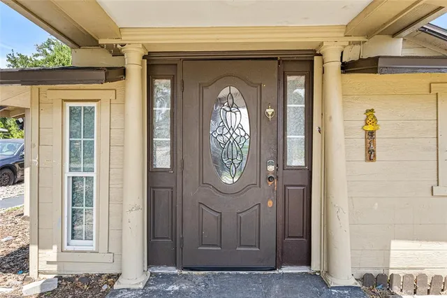 a front view of a house with a door