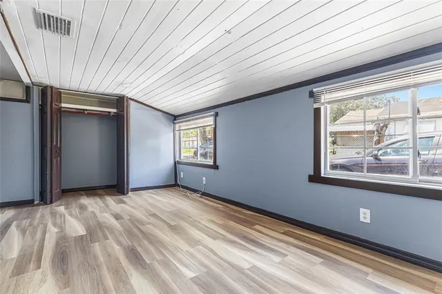 a view of a livingroom with an empty space and window