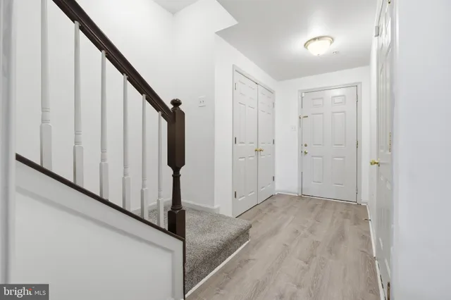 a view of an entryway with staircase