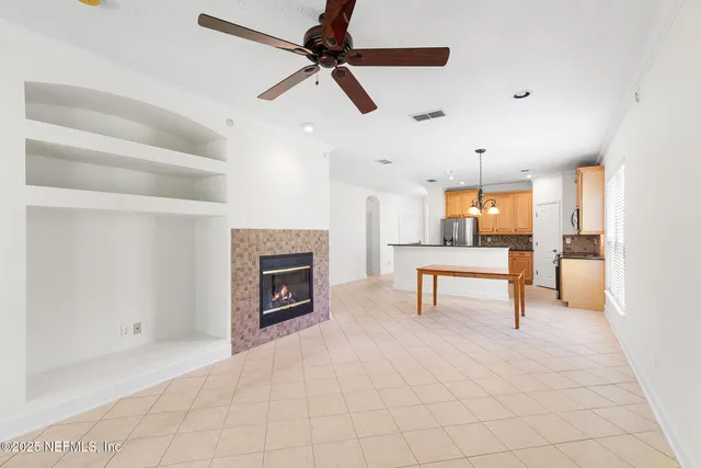 a bathroom with a tub sink shower and mirror