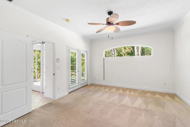a bathroom with a shower sink and mirror