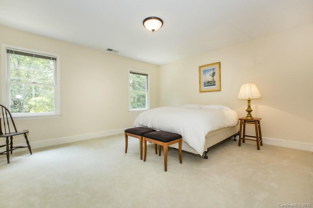 7131 Ramsgate Road Charlotte, NC 28270 - Photo 16 of 24 a bedroom with a bed and a window