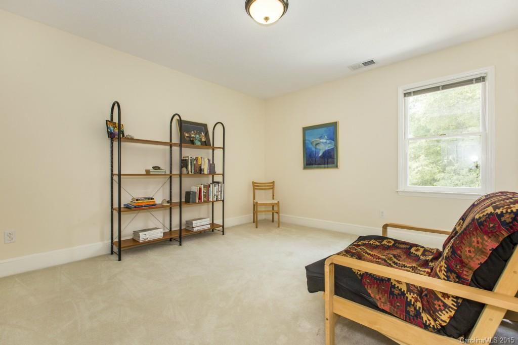 7131 Ramsgate Road Charlotte, NC 28270 - Photo 17 of 24 a bedroom with furniture and a window