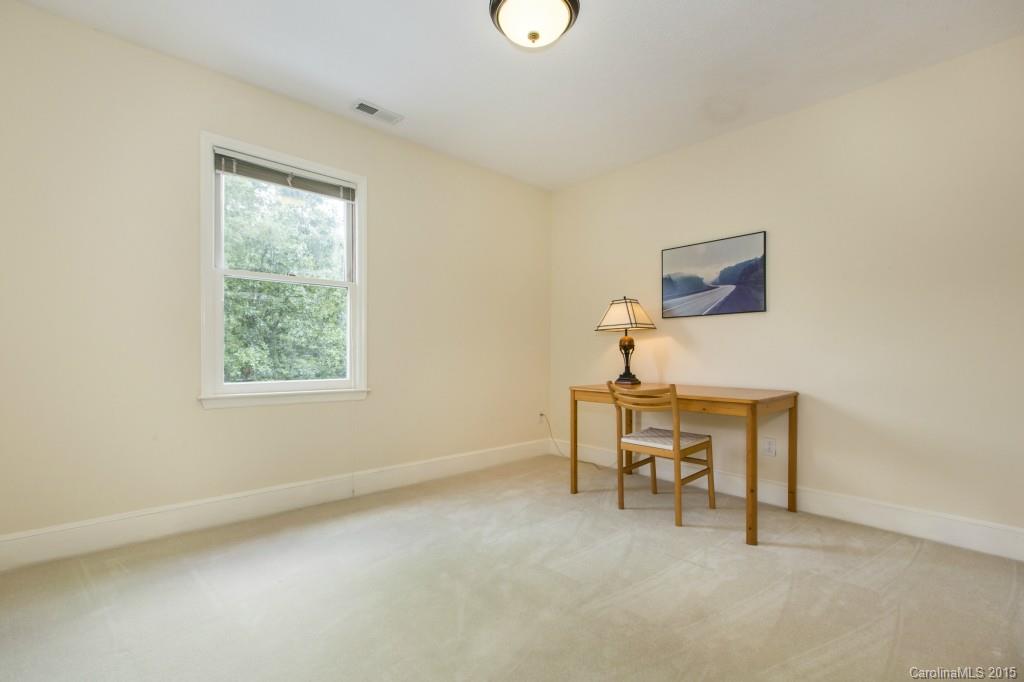7131 Ramsgate Road Charlotte, NC 28270 - Photo 19 of 24 a work room with furniture and a window
