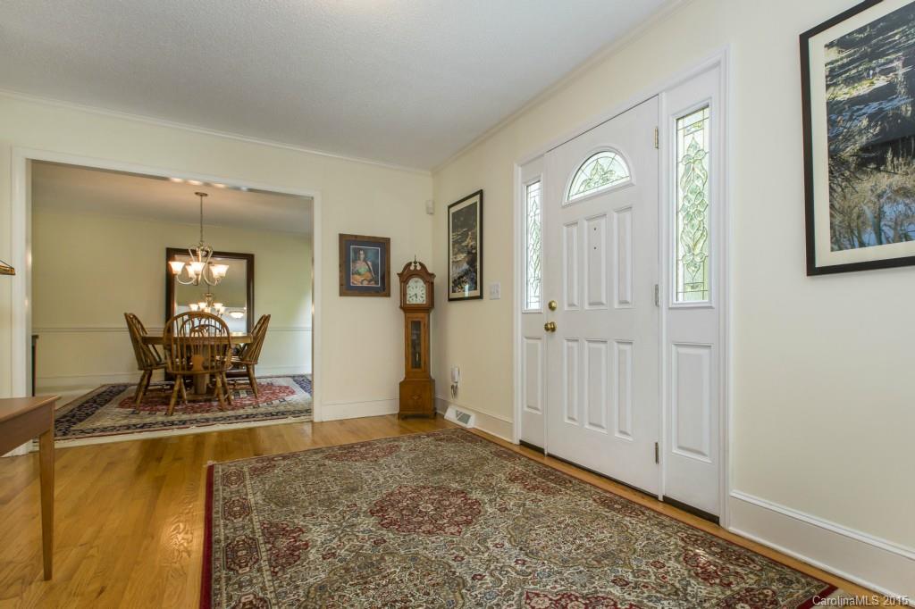 7131 Ramsgate Road Charlotte, NC 28270 - Photo 3 of 24 a view of a livingroom with a dinning table and chair