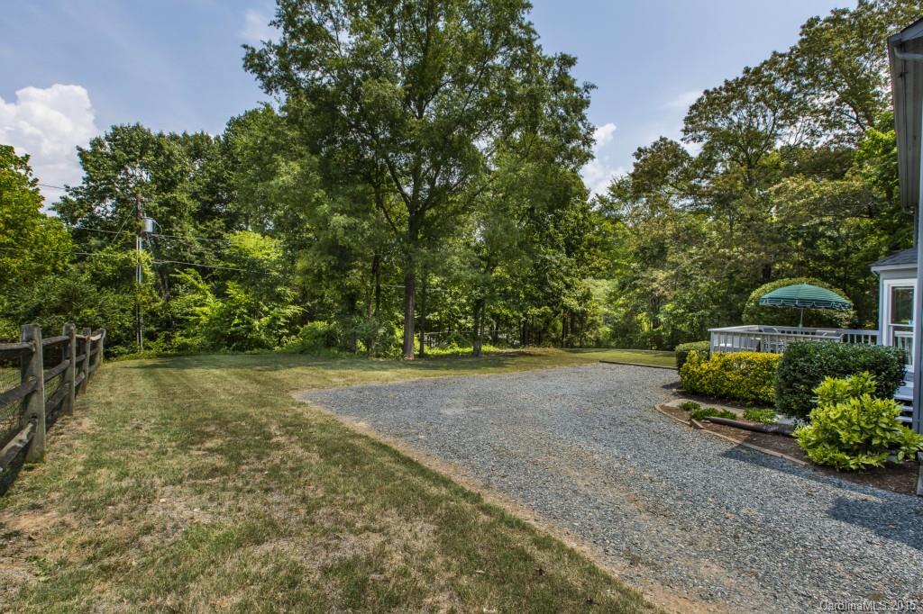 7131 Ramsgate Road Charlotte, NC 28270 - Photo 22 of 24 a view of a backyard