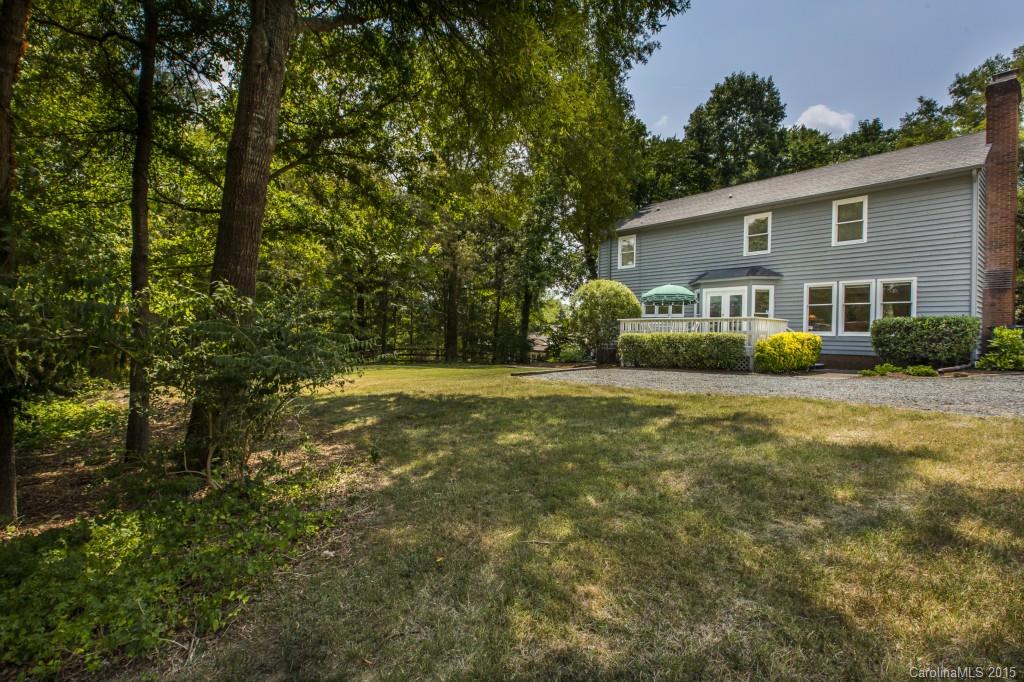 7131 Ramsgate Road Charlotte, NC 28270 - Photo 24 of 24 a view of a house with a yard