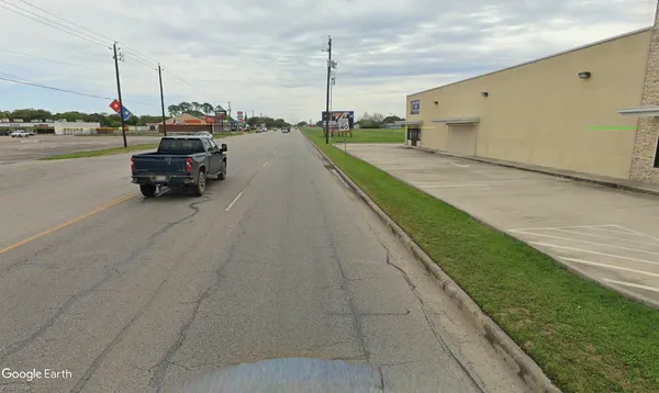 a view of a terrace with yard