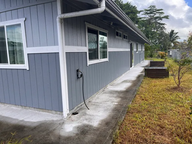 a house view with a backyard space