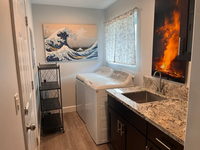 a kitchen with a sink and a window