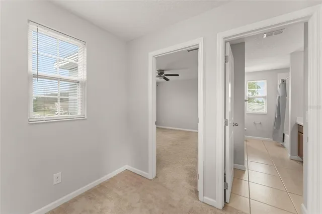 wooden floor and a bathroom with sink