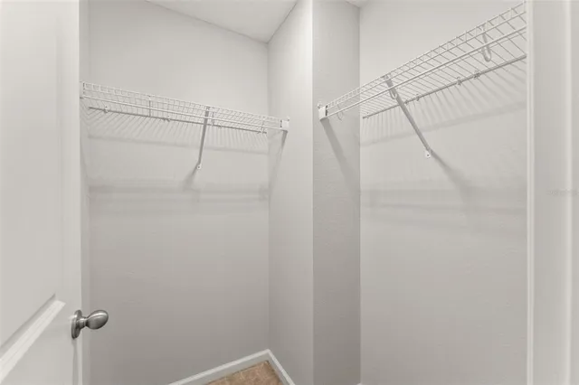 a view of a room with racks on the wall