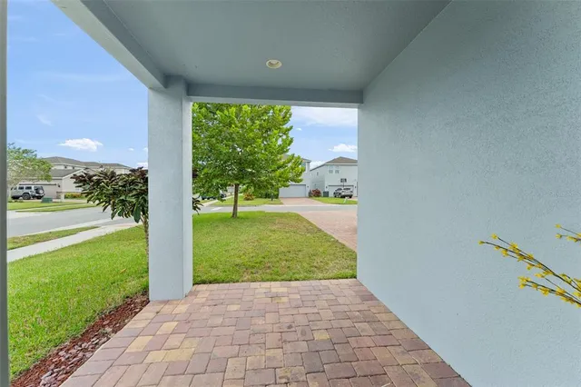 a view of an empty room with a yard