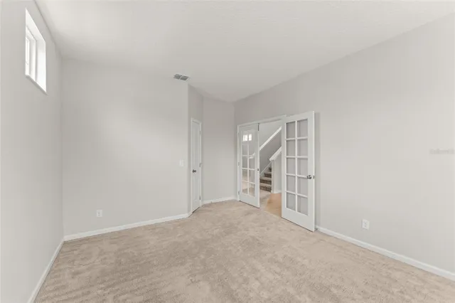 an empty room with windows