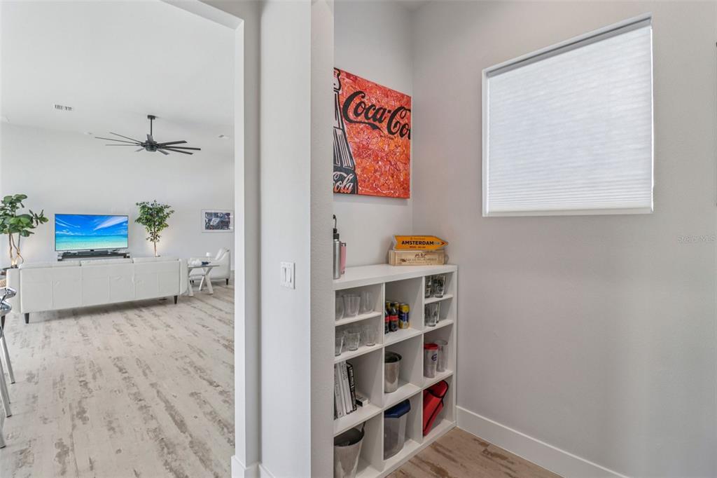 3385 Lake Diane Road Tavares, FL 32778 - Photo 12 of 49 a view of a room with wooden floor and closet