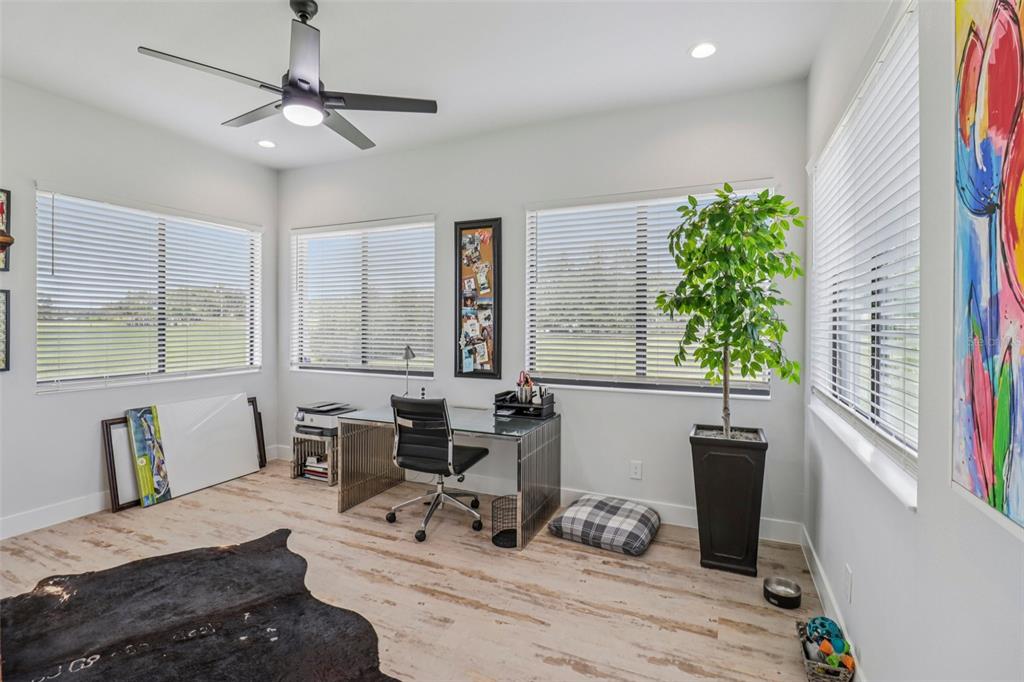 3385 Lake Diane Road Tavares, FL 32778 - Photo 19 of 49 a bedroom with furniture and a window