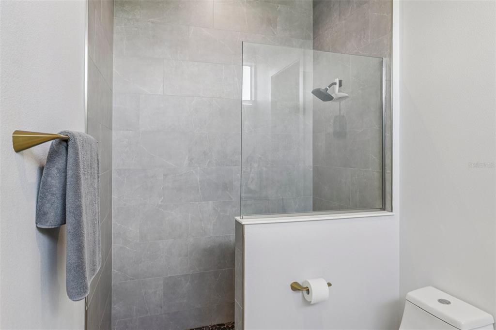 3385 Lake Diane Road Tavares, FL 32778 - Photo 23 of 49 a bathroom with a shower