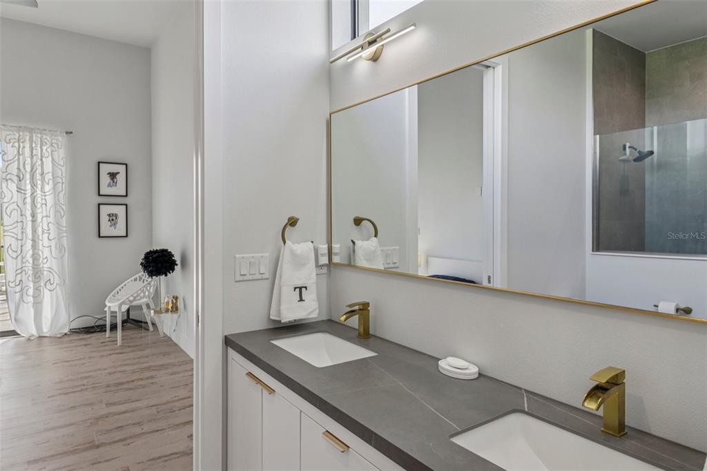 3385 Lake Diane Road Tavares, FL 32778 - Photo 24 of 49 a bathroom with a sink and a mirror