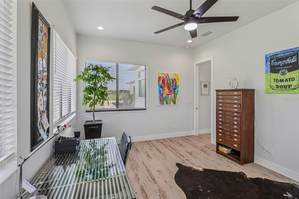 3385 Lake Diane Road Tavares, FL 32778 - Photo 26 of 49 a bedroom with furniture and a window