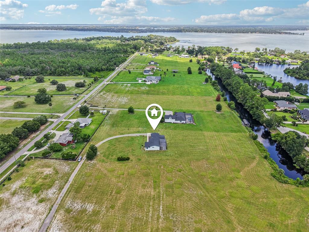 3385 Lake Diane Road Tavares, FL 32778 - Photo 3 of 49 a view of a tennis court