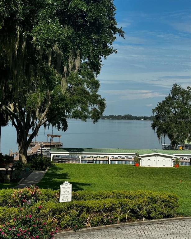 3385 Lake Diane Road Tavares, FL 32778 - Photo 46 of 49 a view of a lake with a building in the background