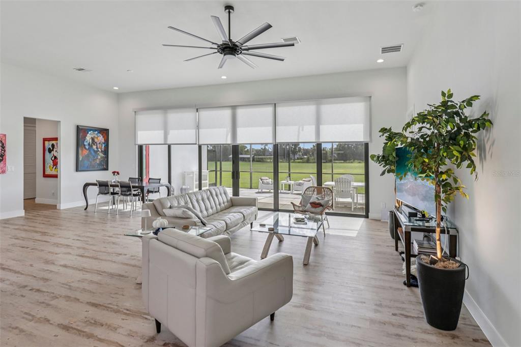 3385 Lake Diane Road Tavares, FL 32778 - Photo 5 of 49 a living room with furniture and a large window