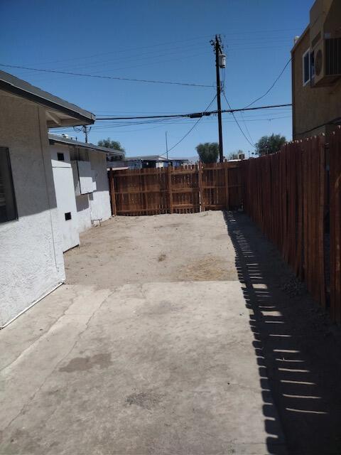 45798 Sage Street Indio, CA 92201 - Photo 7 of 8 a view of a backyard of a house