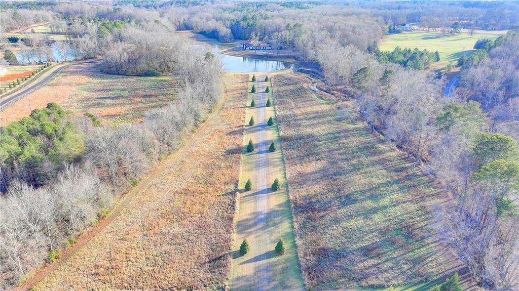 1540 Lipscomb Road Social Circle, GA 30025 - Photo 104 of 130 a view of a pathway with a yard