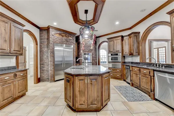 a view of a livingroom with furniture and entryway