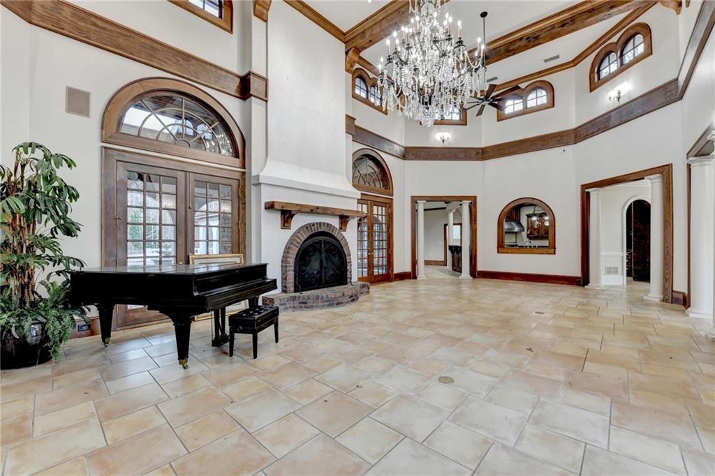1540 Lipscomb Road Social Circle, GA 30025 - Photo 29 of 130 a view of a livingroom with furniture and a chandelier