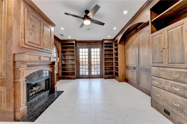 a view of an empty walk in closet with empty racks