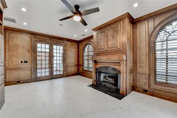 a kitchen with cabinets and window