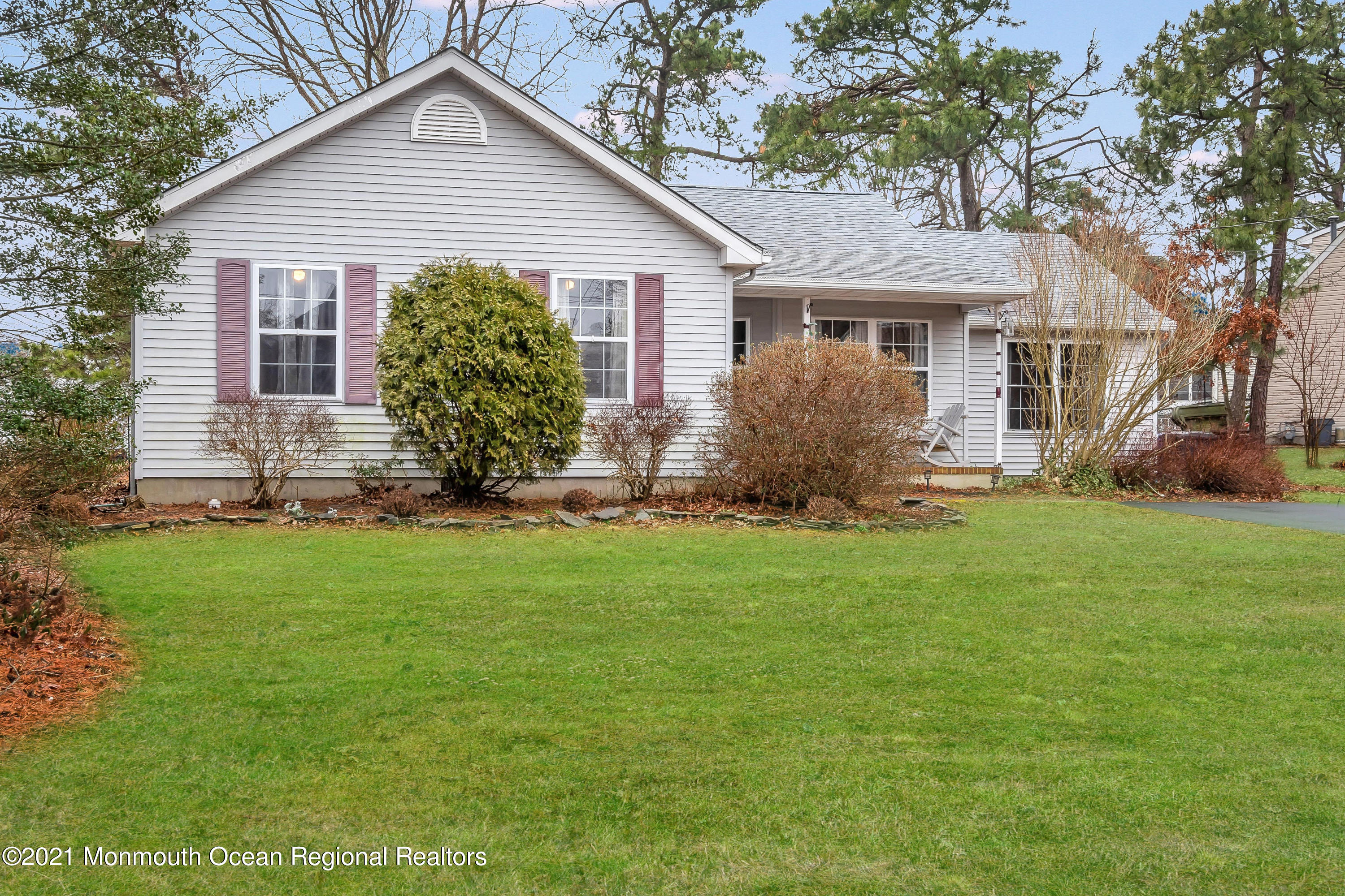 262 Privateer Road Manahawkin, NJ 08050 - Photo 1 of 20 a front view of house with yard and green space