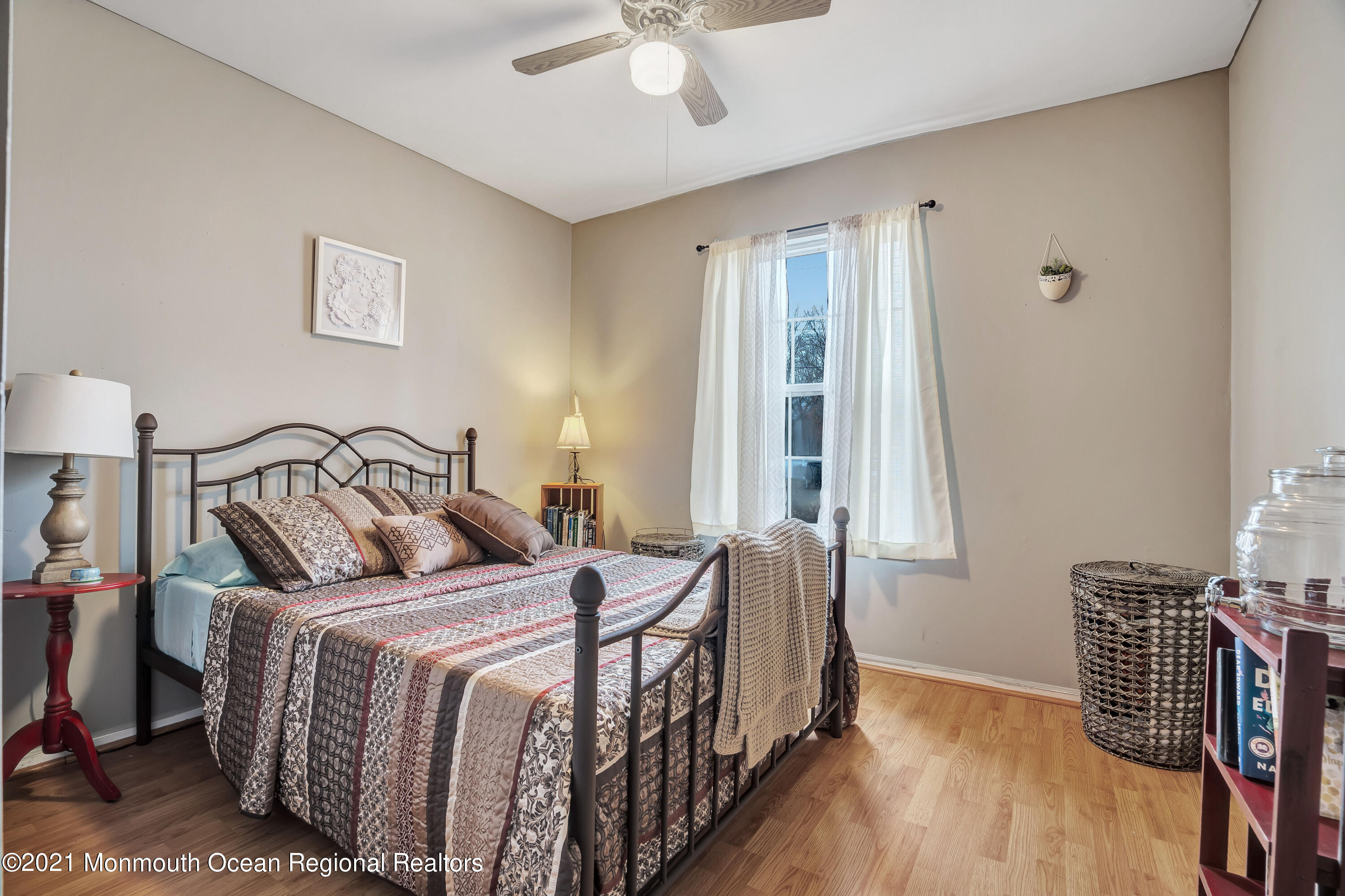 262 Privateer Road Manahawkin, NJ 08050 - Photo 15 of 20 a bedroom with a bed and a window