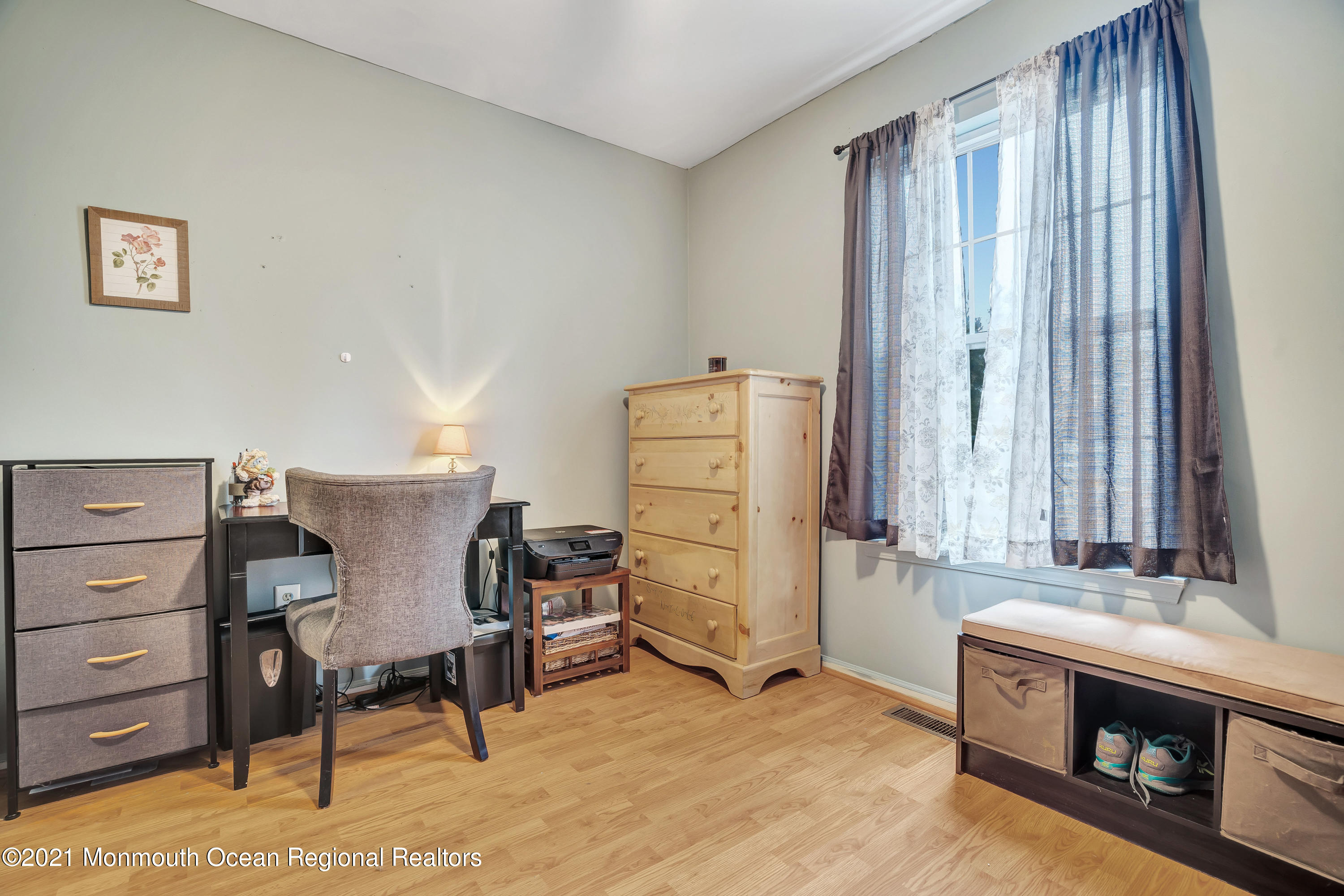 262 Privateer Road Manahawkin, NJ 08050 - Photo 17 of 20 a view of a workspace with furniture and a window