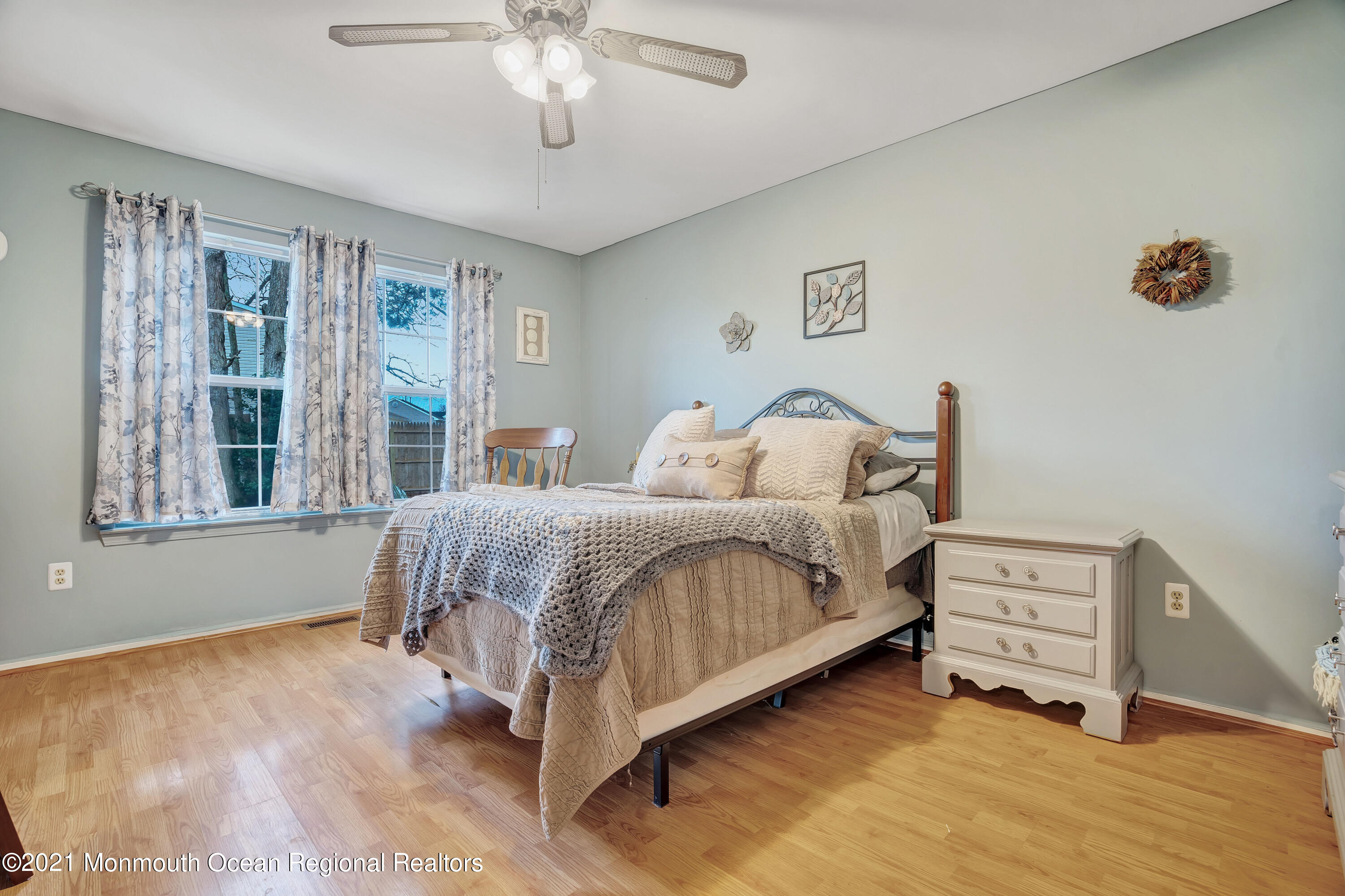 262 Privateer Road Manahawkin, NJ 08050 - Photo 18 of 20 a bedroom with a bed and a window
