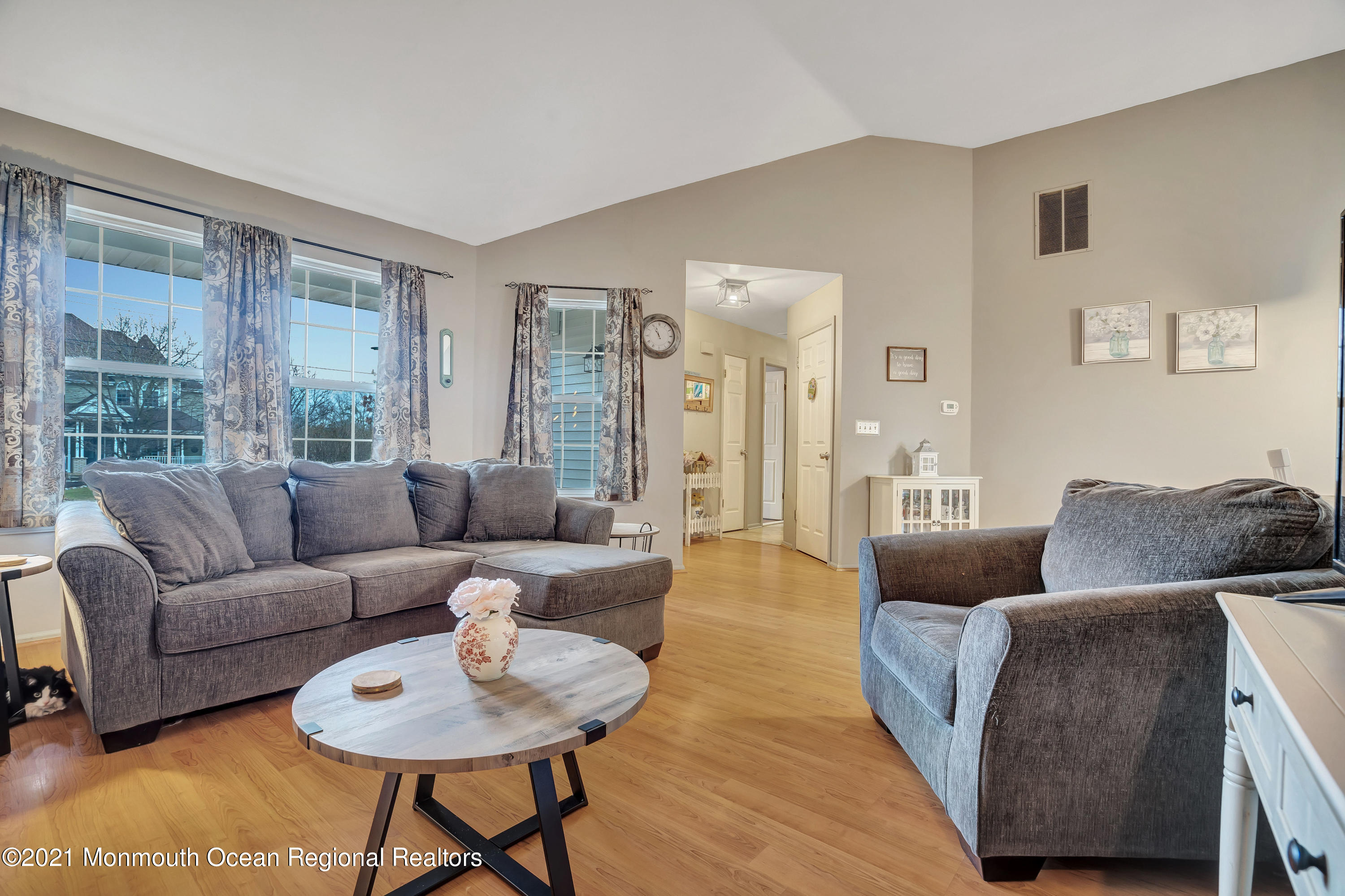 262 Privateer Road Manahawkin, NJ 08050 - Photo 3 of 20 a living room with furniture and a large window