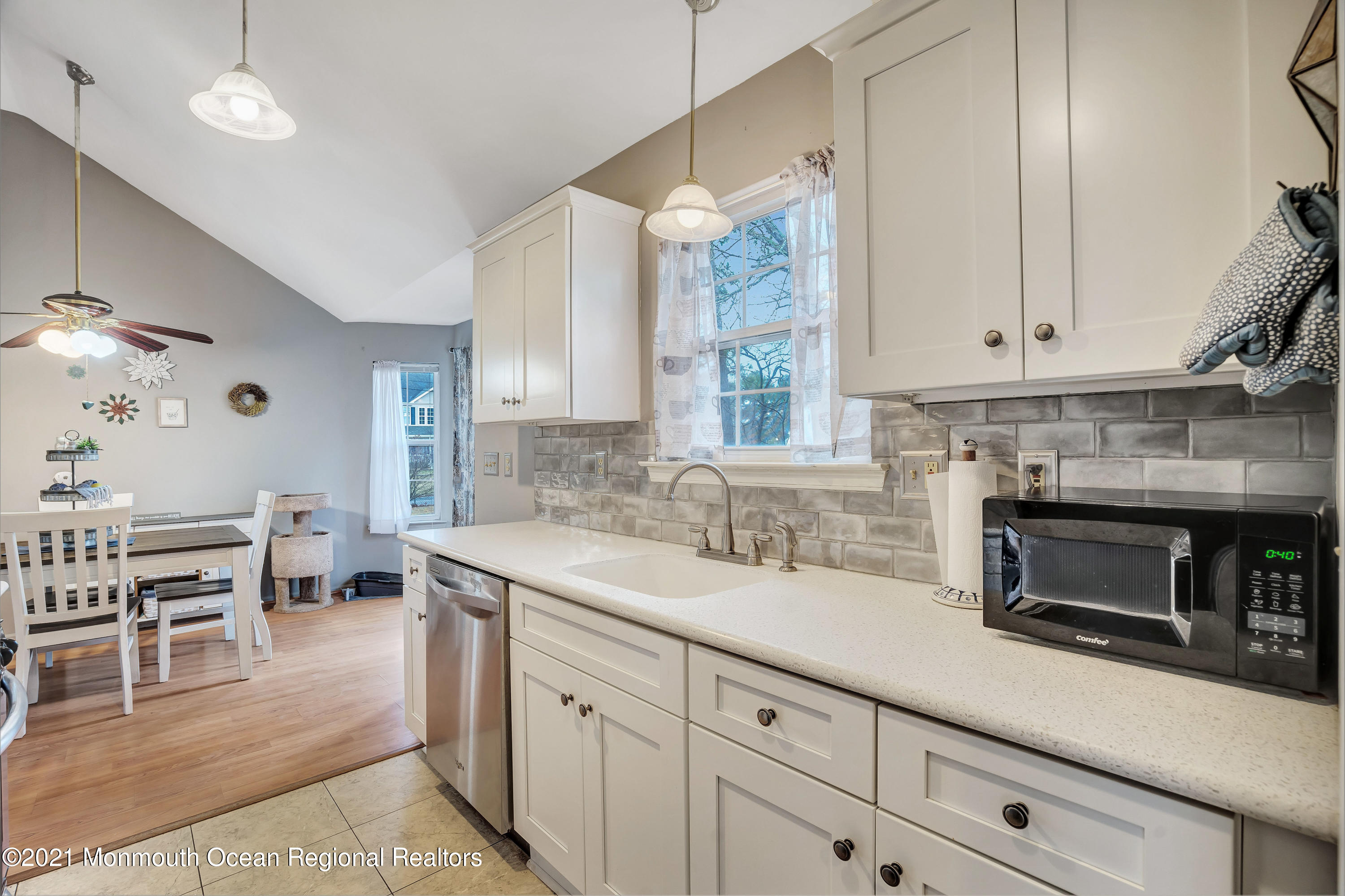262 Privateer Road Manahawkin, NJ 08050 - Photo 10 of 20 a kitchen with appliances a sink and cabinets