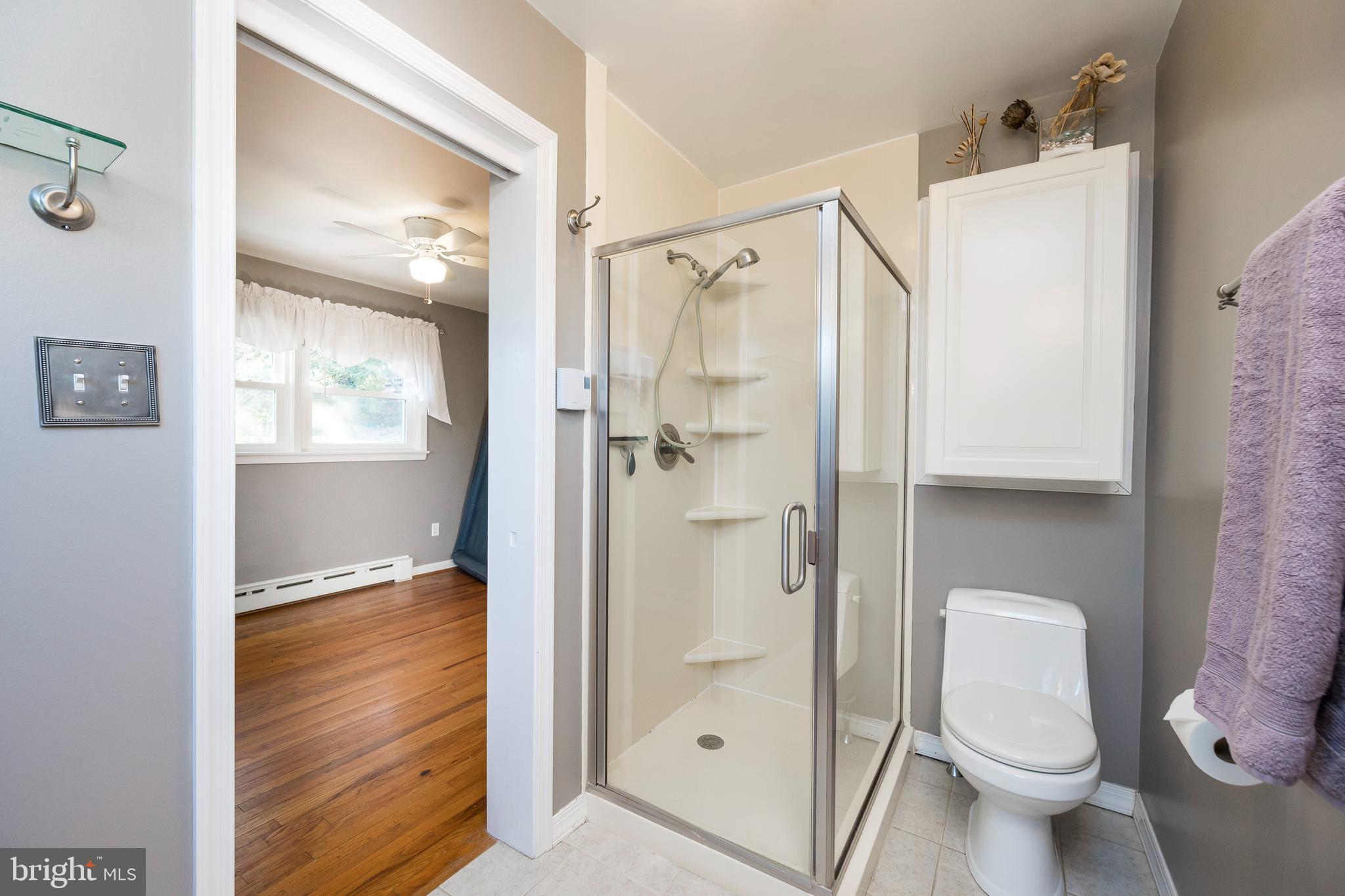 1504 Reed Street Coatesville, PA 19320 - Photo 19 of 33 Main bath - pocket door & radiant heat floor