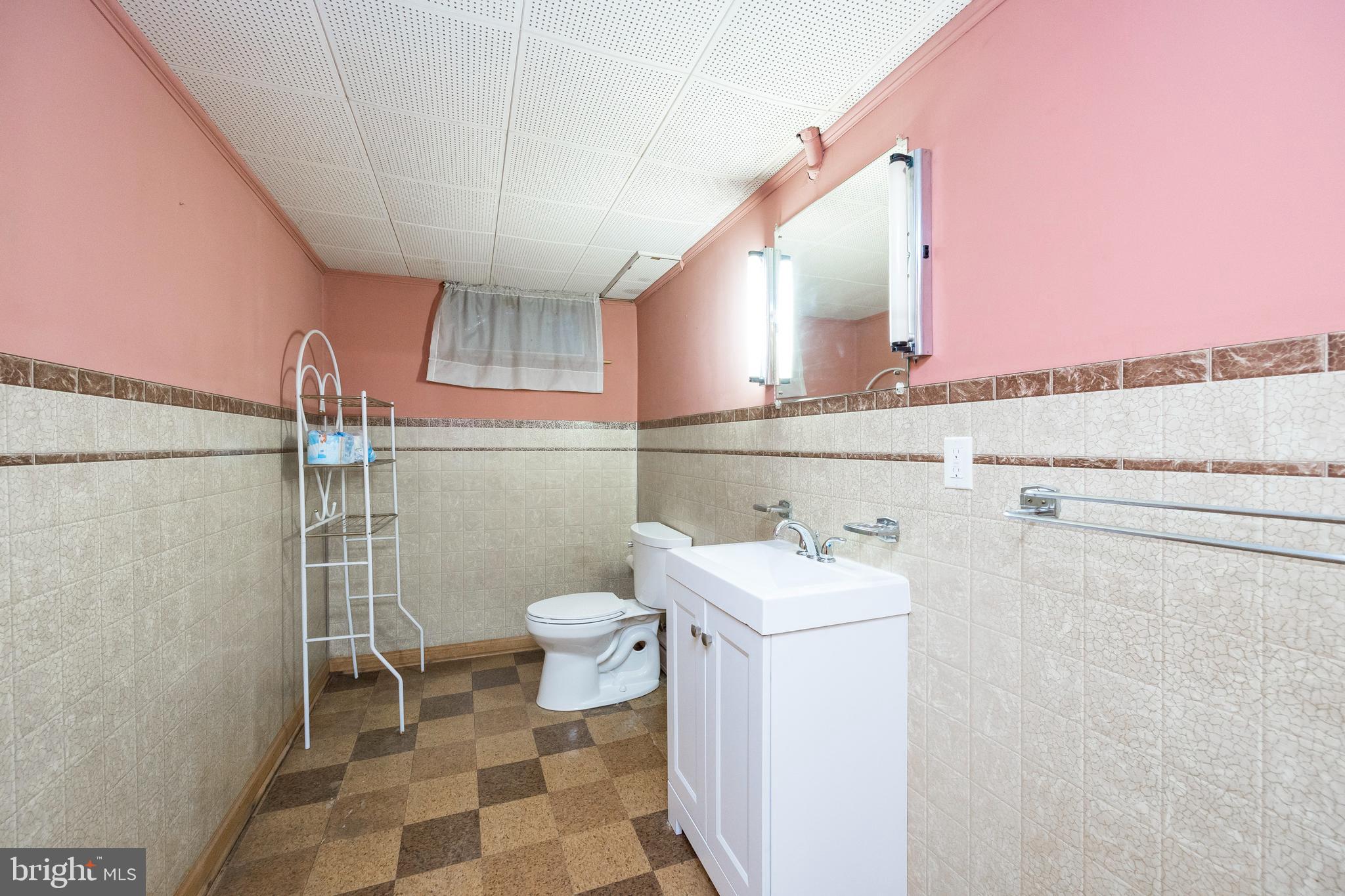 1504 Reed Street Coatesville, PA 19320 - Photo 24 of 33 Basement half bath