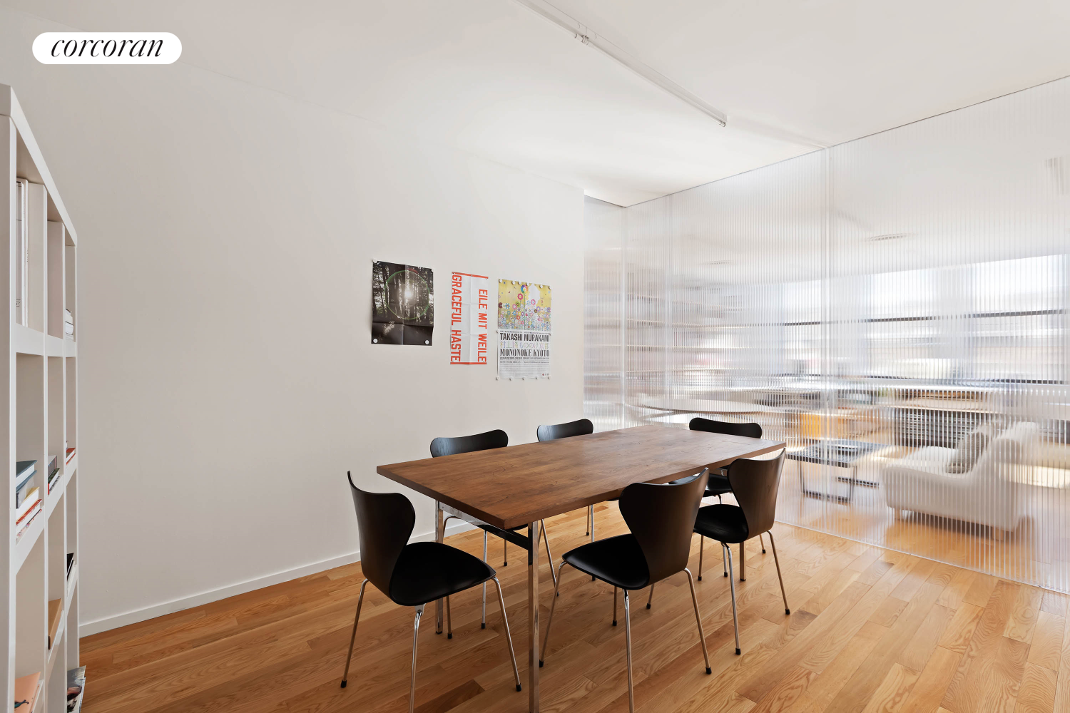53 Elizabeth Street, Unit 4A Manhattan, NY 10013 - Photo 7 of 11 a view of a dining room with furniture and wooden floor