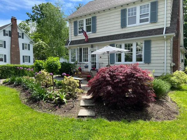 a view of a house with a garden