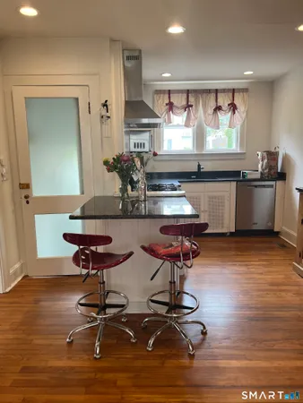 a room with table chairs