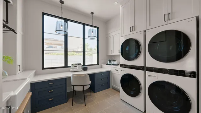 a view of a kitchen with cabinets and wooden floor