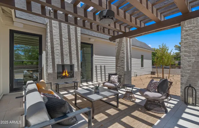 an aerial view of a house with garden space and street view
