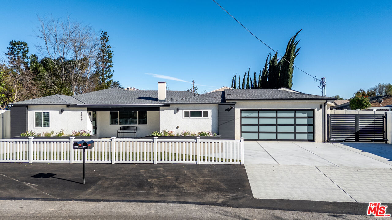 8446 Penfield Avenue Winnetka, CA 91306 - Photo 2 of 38 a front view of a house with a porch