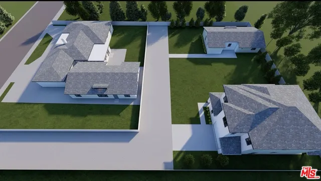 an aerial view of a house with a yard basket ball court and outdoor seating