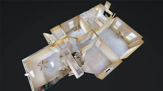 an aerial view of a house with a swimming pool and outdoor seating